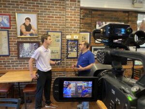 Aaron Hanania interviews Freedy's Pizza owner Joe Quercia in Cicero on the "It's Not So Late Show"