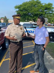 Aaron interviewing Cook County Undersheriff Marlon Parks for Cicero TV. This was a part of the Cook County Sheriff vehicle light repair program on August 10th, 2023. [Photo courtesy of Aaron Hanania]